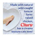 Heart-shaped plate with two pieces of fish and text about Churu cat food on a marble background