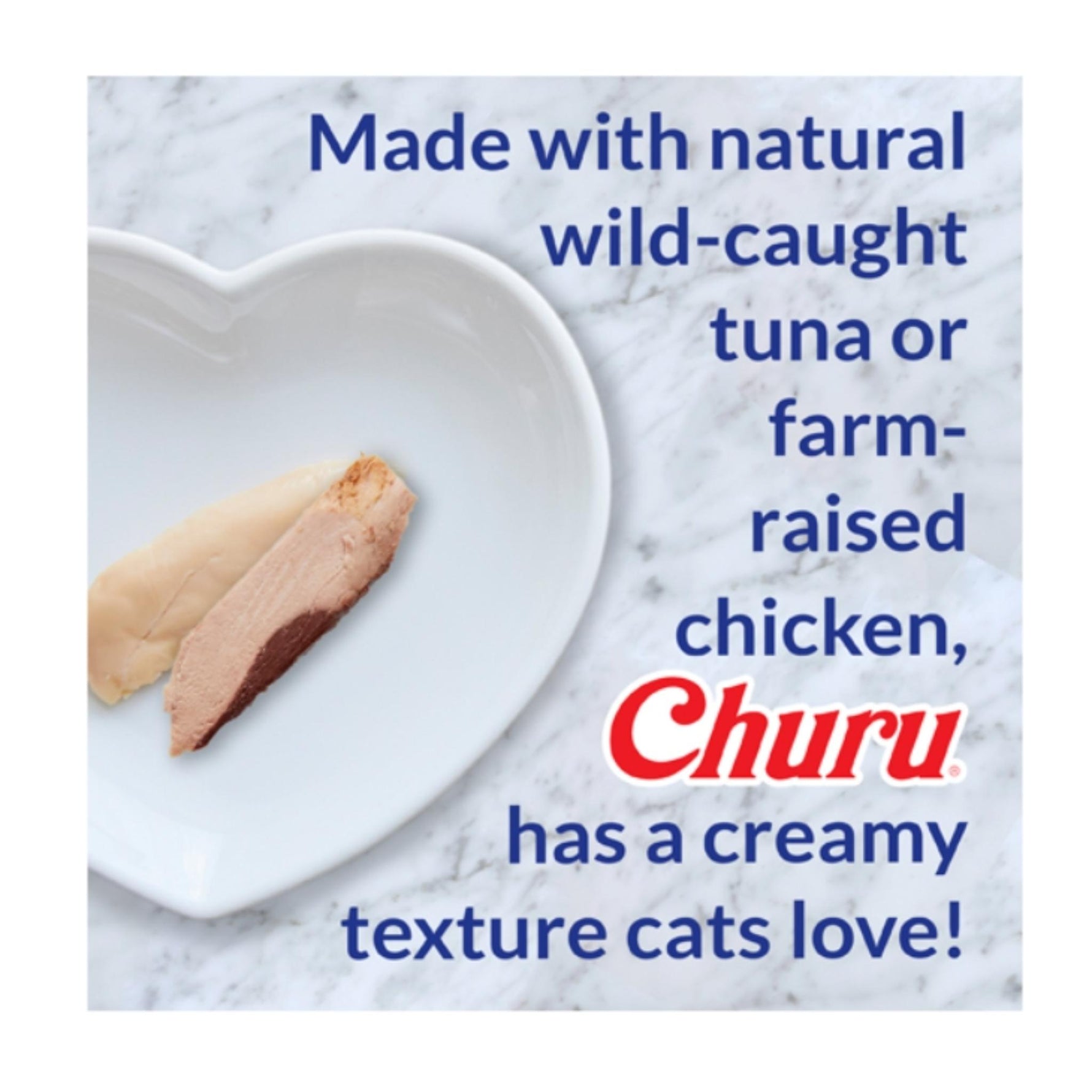 Heart-shaped plate with two pieces of fish and text about Churu cat food on a marble background