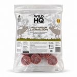 A 1kg bag of Wild HQ Wild Venison Cat Medallions, showing the clear front packaging with the brand logo, product name, and visible round cat treats inside.