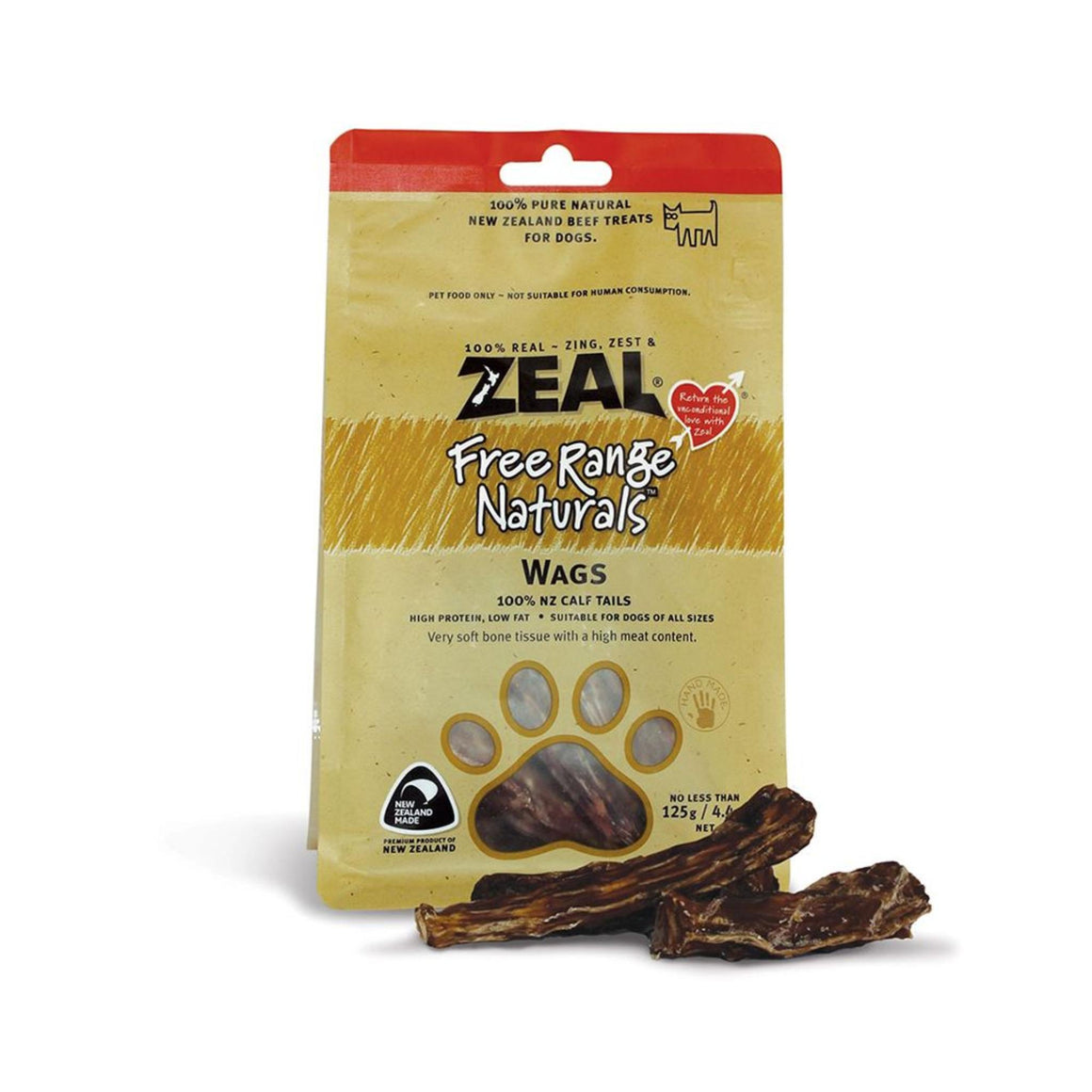 A package of Zeal Free Range Naturals Wags dog treats standing upright on a white background, with two brown bone-shaped treats placed in front of the bag.