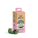 Beco dog poop bags in lavender and cedarwood scent, shown with a roll of green bags in front of its pink and kraft paper packaging box on a white background.