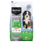Black Hawk Puppy Original Chicken & Rice dog food package on a white background