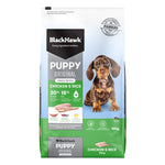 Black Hawk Puppy Original Chicken & Rice dog food package on a white background