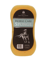 Care & Day & Martin Horse Care Sponge in a yellow porous material with a black and light blue label featuring a horse graphic.