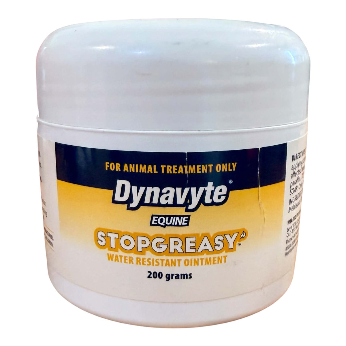 A white plastic jar of Dynavyte Equine Stopgreasy Water Resistant Ointment, 200 grams, on a white background.