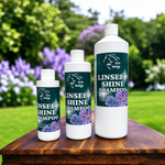Three bottles of Eco Horse Linseed Shine Shampoo on a wooden surface with a natural background.