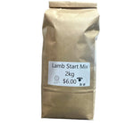 A 2kg paper bag of Lamb Start Mix, featuring a white label with black text and a small sheep icon, set against a plain white background.