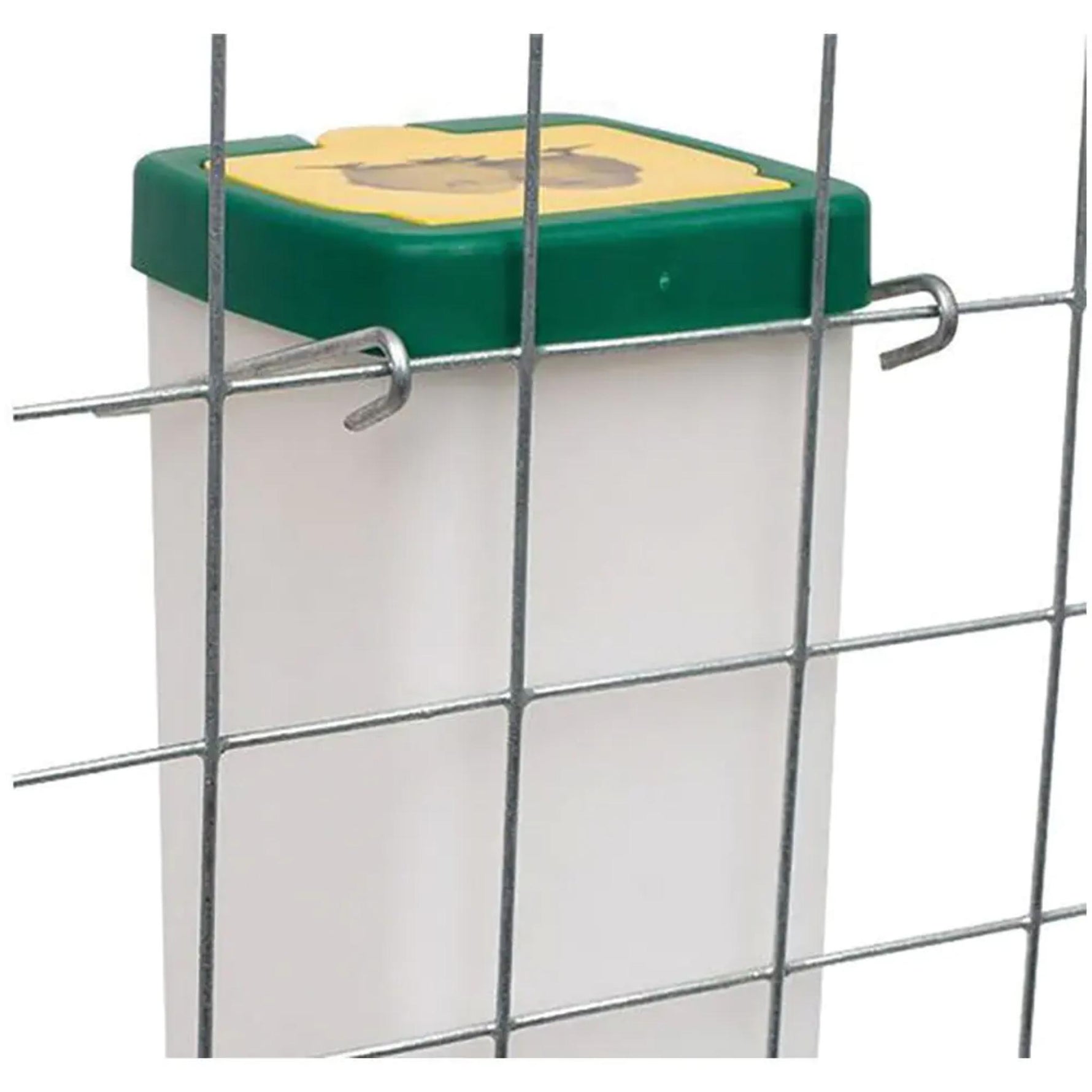 Poultry drinker for chicks shown hanging from a cage