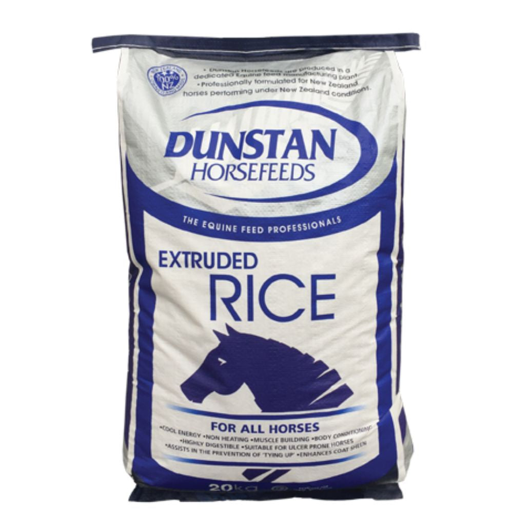 A bag of Dunstan Extruded Rice horse feed with branding and product information printed on the label.